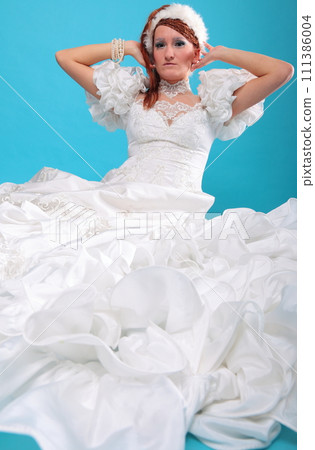 Beautiful ginger in a dress of Snow Queen Beautiful ginger in a dress of Snow Queen 111386004