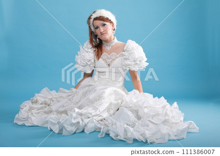 Beautiful ginger in a dress of Snow Queen Beautiful ginger in a dress of Snow Queen 111386007