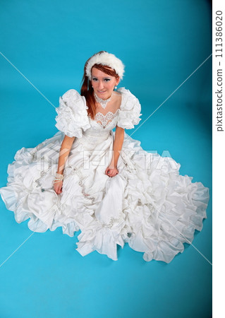 Beautiful ginger in a dress of Snow Queen 111386020