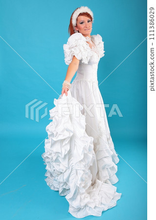 Beautiful ginger in a dress of Snow Queen Beautiful ginger in a dress of Snow Queen 111386029