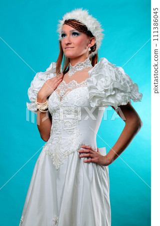 Beautiful ginger in a dress of Snow Queen Beautiful ginger in a dress of Snow Queen 111386045