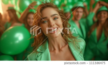 Happy St. Patrick's Day. Young woman with clover stickers on her cheeks, wearing a straw hat, celebrates St. Patrick's Day 111386475