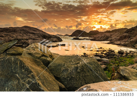 Coastline at sunset in Norway Coastline at sunset in Norway 111386933