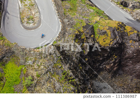 Trolls Path Trollstigen mountain road in Norway 111386987