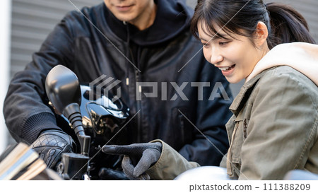 Men and women who enjoy motorcycles 111388209