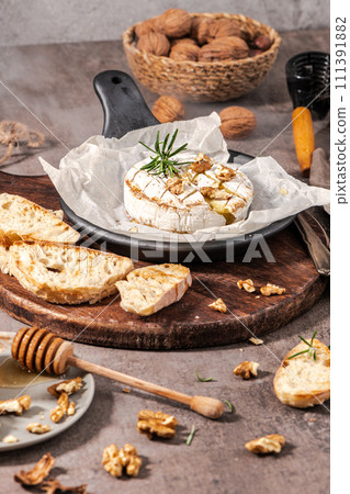 Fresh sliced Camembert cheese 111391882