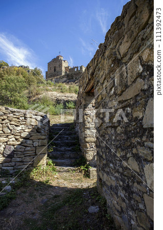 Shaonin temple on the southeastern spur of Mount Shoana. View from the west. Village named after Kosta Khetagurov, Karachay district. Karachay-Cherkessia. Russia 111392473
