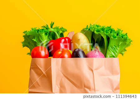 Craft brown shopping paper bag and grocery on blue background. Delivery concept Craft brown shopping paper bag and grocery on blue background. Delivery concept 111394643