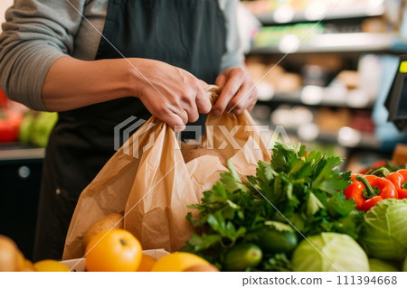 Grocery store cashier packing food into a reusable bag. Generative AI Grocery store cashier packing food into a reusable bag. Generative AI 111394668