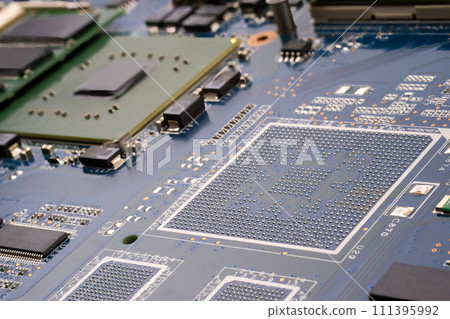 Concept cyber security. A detailed shot of a computer motherboard, featuring a CPU, chipsets and circuit board showcasing the intricate engineering and composite materials used in its manufacturing 111395992