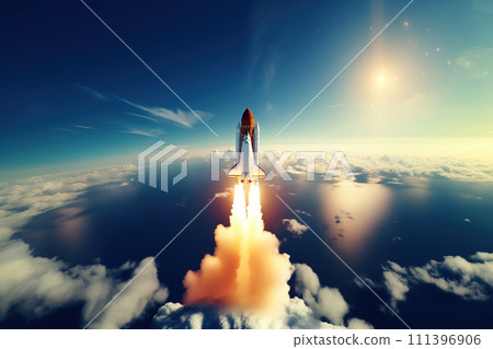 Aerial view of rocket launch at sunrise over ocean coast 111396906