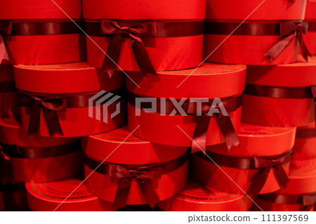 Closeup of gift boxes tied with ribbons Closeup of gift boxes tied with ribbons 111397569