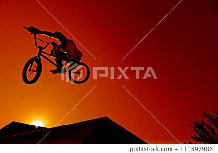 Bmx rider at jump Bmx rider at jump 111397986