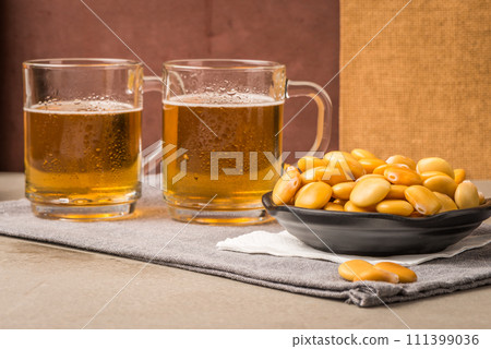 Tasty lupins and glass of beer 111399036