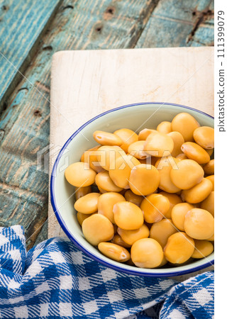 Tasty lupins in metal mug Tasty lupins in metal mug 111399079
