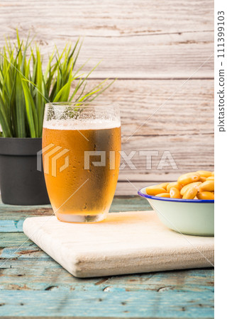 Tasty lupins and glass of beer 111399103