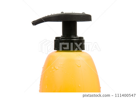 Close up of yellow shampoo bottle cap 111400547