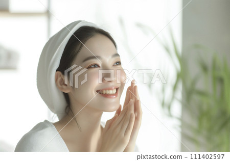 A woman giving a facial massage (AI generated image) 111402597