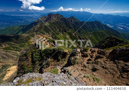 Mt. Gongen, the Southern Alps and Mt. Fuji seen from Mt. Amida in the Yatsugatake Mountain Range Mt. Gongen, the Southern Alps and Mt. Fuji seen from Mt. Amida in the Yatsugatake Mountain Range 111404638