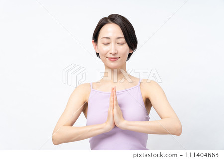 Middle-aged woman doing yoga, woman doing exercises Middle-aged woman doing yoga, woman doing exercises 111404663