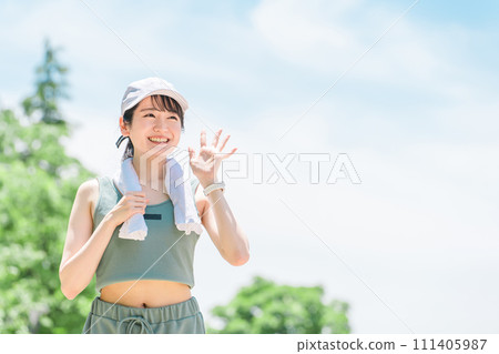 Women exercising, training, walking in the park (towels, sweating, detox) Women exercising, training, walking in the park (towels, sweating, detox) 111405987