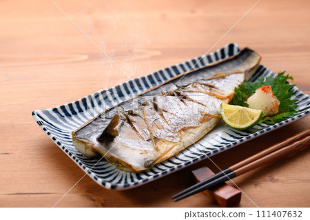Grilled mackerel with salt 111407632