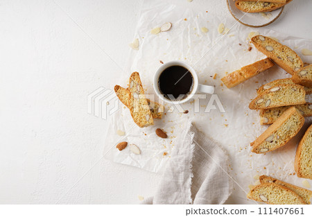 Cantucci and coffee. Italian double baked cookies (biscotti) and a cup of morning coffee 111407661