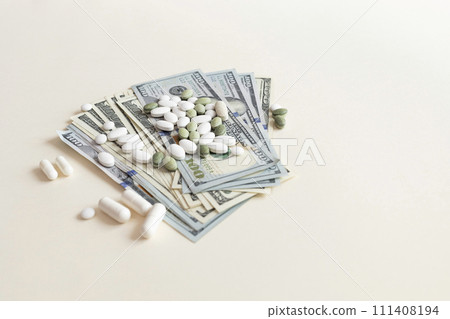 Closeup Many Dollar Money Banknotes And Different Pills Or Tablets. Expensive Medicine And Healthcare Insurances. Inflation. Big Pharma, Pharmaceutical Industry. Horizontal Plane. 111408194