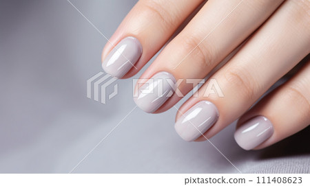 Glamour woman hand with gray nail polish on her fingernails. Gray color nail manicure with gel polish at luxury beauty salon. Nail art and design. Female hand model. French manicure. Generative AI. 111408623