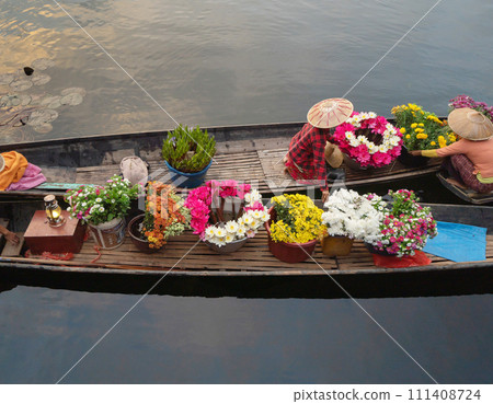 Damnoen Saduak Floating Market or Amphawa. Local people sell fruits, traditional food on boats in canal, Ratchaburi District, Thailand. Famous Asian tourist attraction destination. Festival in Asia. Damnoen Saduak Floating Market or Amphawa. Local people sell fruits, traditional food on boats in canal, Ratchaburi District, Thailand. Famous Asian tourist attraction destination. Festival in Asia. 111408724