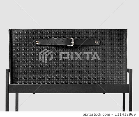 Black leather woven drawer with applied handle on metal shelving unit Black leather woven drawer with applied handle on metal shelving unit 111412969