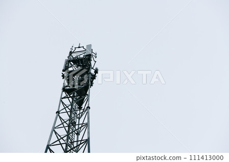 Deployment of the 5G network. Laying antennas on a mobile phone mast in the winter atmosphere Deployment of the 5G network. Laying antennas on a mobile phone mast in the winter atmosphere 111413000
