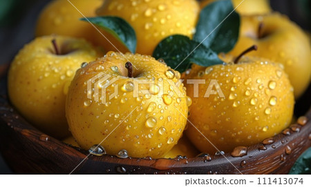 wet yellow apples closeup 111413074