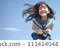 High school girl jumping with a joyful smile against the sky Copy space AI Generated 111414048