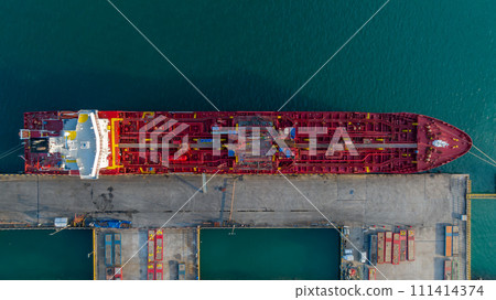 Aerial view crude oil tanker at port, Oil tanker loading and unloading in oil terminal station refinery, Global business import export logistic transport sea freight cargo tanker, Red crude oil tanker 111414374