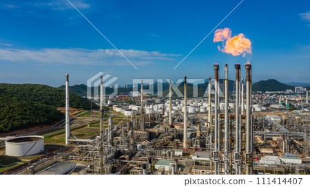 Aerial view Oil and Gas refinery petrochemical plant industrial with oil and gas storage tank. White oil and gas refinery storage tank. Aerial view oil and gas refinery plant from industrial zone. 111414407