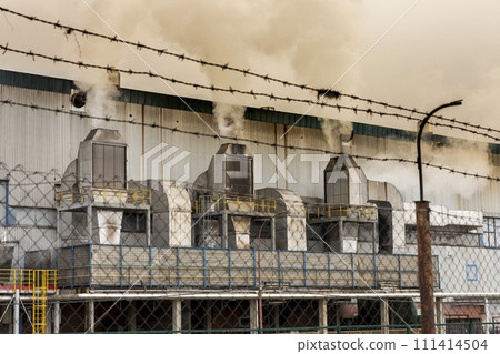 Air pollution from power plant chimneys. Deadly smoke emmiting from the factory 111414504