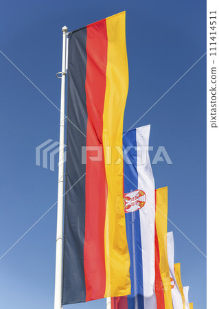German and Serbian flags. Government, politics, diplomacy, trade, foreign relations between european countries German and Serbian flags. Government, politics, diplomacy, trade, foreign relations between european countries 111414511