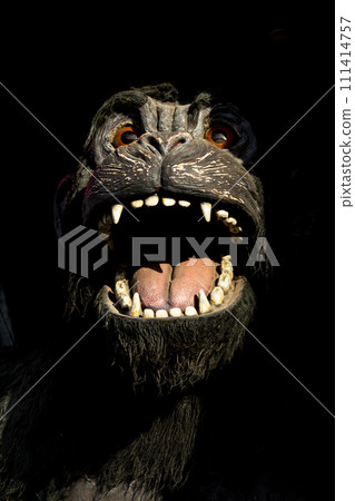 Gorilla monster. Scary and angry gorilla with big jaws and evil eyes. Puppets, toys and statues Gorilla monster. Scary and angry gorilla with big jaws and evil eyes. Puppets, toys and statues 111414757