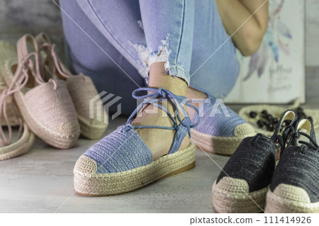 Summer sandals on a womans feet. Beauty fashion style 111414926