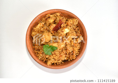 Pilaf in a plate on a white background. Pilaf in a plate on a white background. 111415189