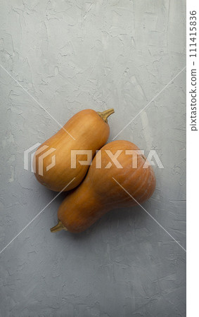 ripe autumn pumpkin. Halloween pumpkin close up background. Seasonal autumn food. healthy food 111415836