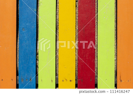Colorful wooden boardwalk. Wooden boards. Empty space, for text or logo Colorful wooden boardwalk. Wooden boards. Empty space, for text or logo 111416247
