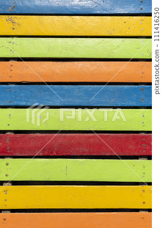 Colorful wooden boardwalk. Wooden boards. Empty space, for text or logo Colorful wooden boardwalk. Wooden boards. Empty space, for text or logo 111416250