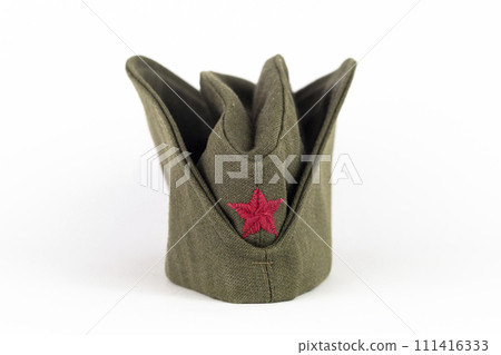 Military cap. Yugoslavian army side cap with red star from the time of communism and world war era Military cap. Yugoslavian army side cap with red star from the time of communism and world war era 111416333