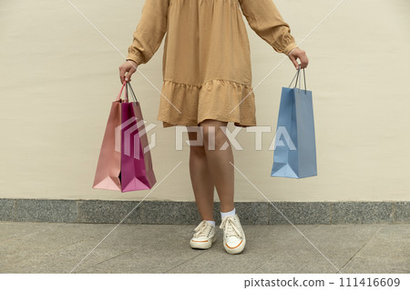 Flowers in paper, gift bags, on the street. 111416609