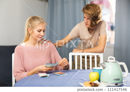 Teenager asking for money from mother calculating running costs Teenager asking for money from mother calculating running costs 111417546