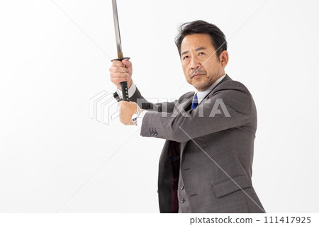 A man in a suit holding a sword 111417925