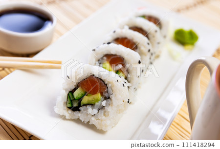 Set of uramaki rolls with salmon, avoado and cucumber closeup 111418294