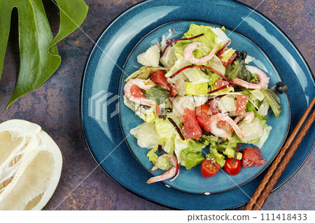 Salad with pomelo, shrimp and greens. 111418433